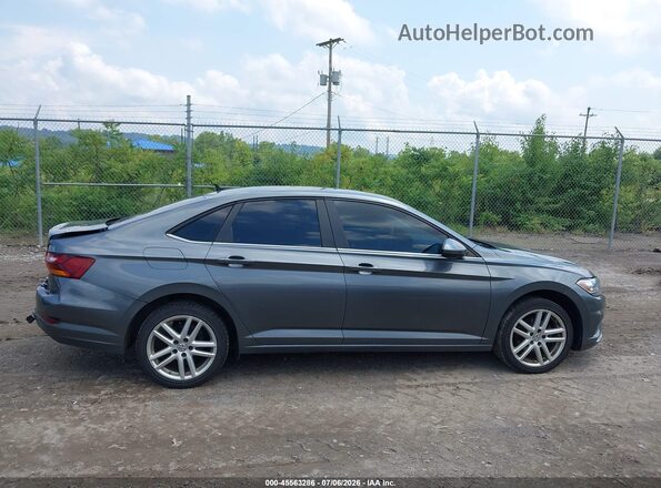 3VWN57BU3KM062926 2019 VOLKSWAGEN JETTA Серый Вид задней части салона