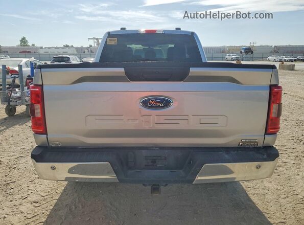 1FTEX1EP7NFB29404 2022 FORD F150 Серебряный Вид салона спереди