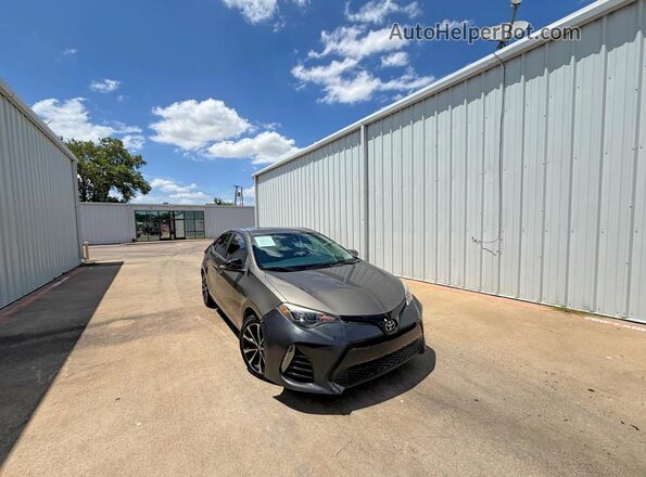 5YFBURHE0HP631432 2017 TOYOTA COROLLA Gray Trasero izquierdo