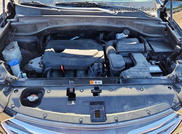 5NMZUDLB4JH104119 2018 HYUNDAI SANTA FE Black VIN sticker view