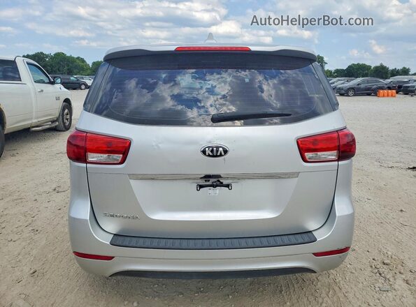 KNDMA5C18H6261174 2017 KIA SEDONA Silver წინა სალონის ხედი