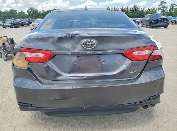 4T1G11AK8LU306499 2020 TOYOTA CAMRY Gray Vista interior delantera