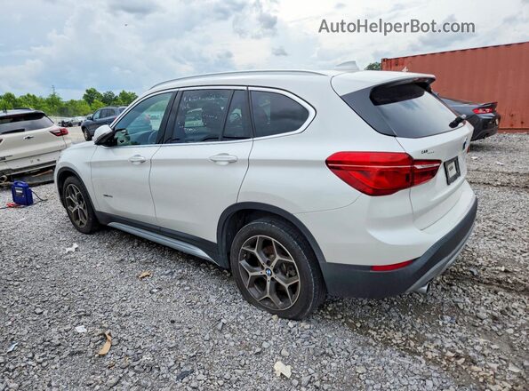 WBXHU7C31J5H42519 2018 BMW X1 White Trasero derecho