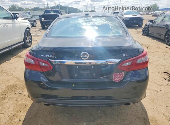 1N4AL3AP7JC158981 2018 NISSAN ALTIMA Black Vista interior delantera