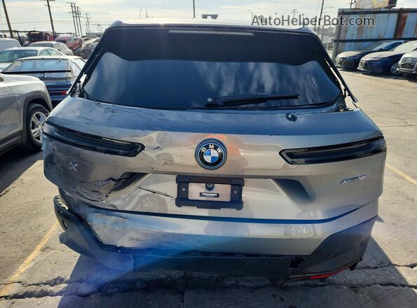 WB523CF03PCM19294 2023 BMW IX Gray Vista interior delantera