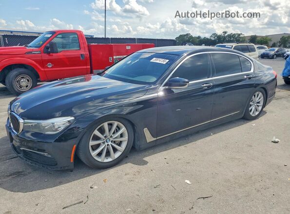 WBA7E4C50JGV23989 2018 BMW 7 SERIES Black Tył lewy