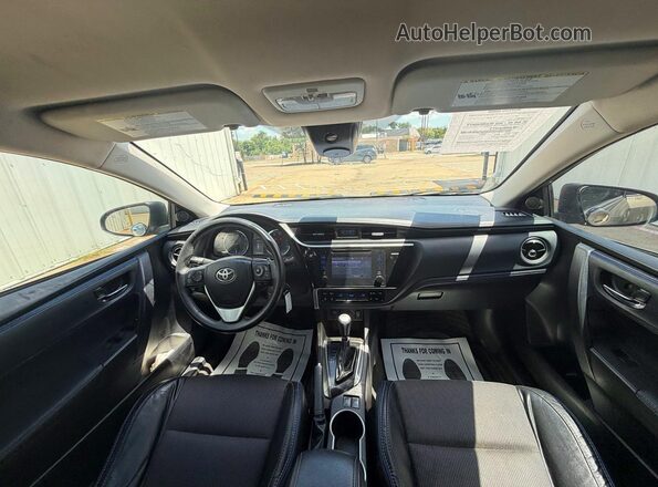 5YFBURHE0HP631432 2017 TOYOTA COROLLA Gray Vista de los asientos traseros