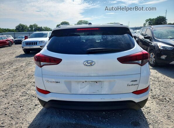KM8J3CA42HU324615 2017 HYUNDAI TUCSON Белый Вид салона спереди
