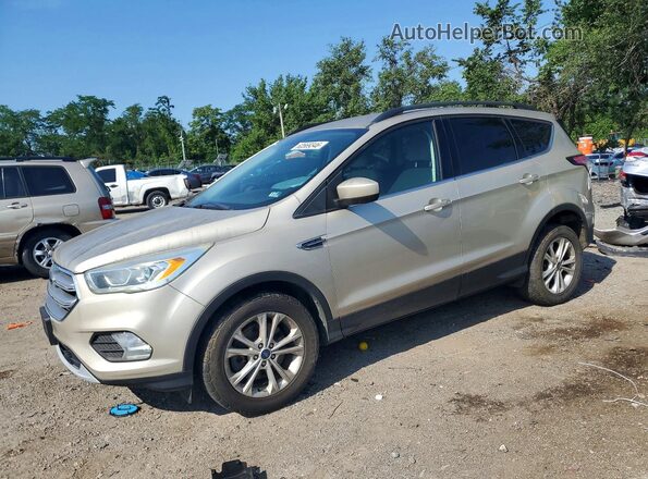 1FMCU9GD3HUC19937 2017 FORD ESCAPE Beige Trasero izquierdo