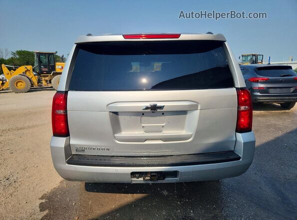 1GNSKHKC7KR395180 2019 CHEVROLET SUBURBAN Серебряный Вид салона спереди