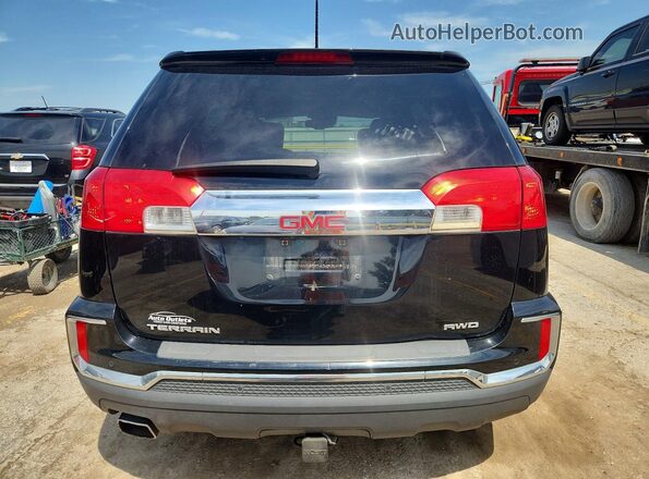 2GKFLUEK6H6328470 2017 GMC TERRAIN Black Front interior view