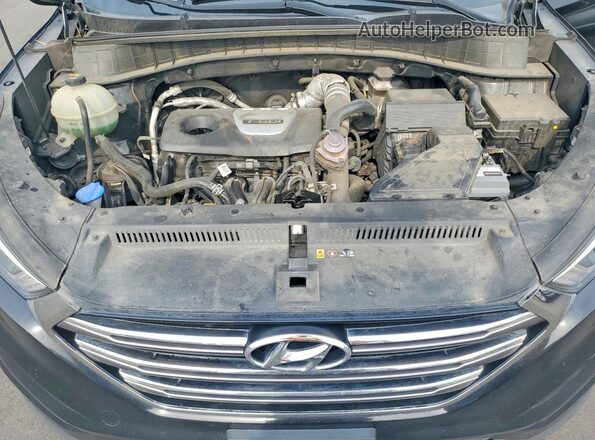 KM8J33A29GU080748 2016 HYUNDAI TUCSON Black Vista del compartimento del motor