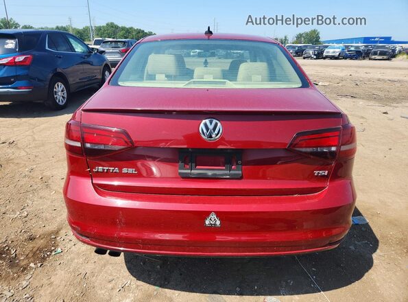 3VWL07AJ5GM323557 2016 VOLKSWAGEN JETTA Red Front interior view