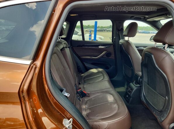 WBXHU7C3XH5H32940 2017 BMW X1 Brown Вид підкапотного простору