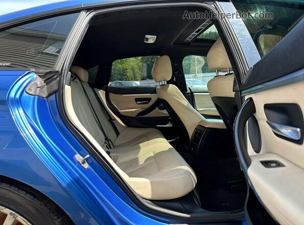 WBA4B3C54GG527753 2016 BMW 4 SERIES Blue Rear seats view