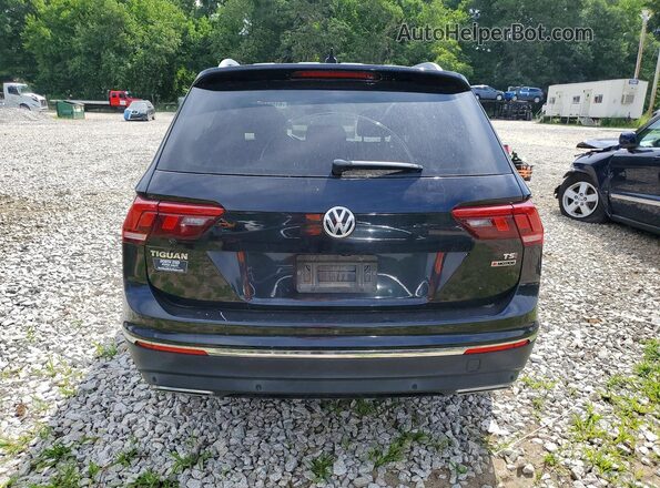 3VV4B7AX7JM067713 2018 VOLKSWAGEN TIGUAN Black Vista interior delantera