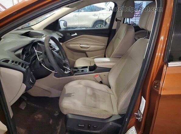 1FMCU0GD5HUC81867 2017 FORD ESCAPE Brown Widok deski rozdzielczej
