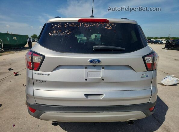 1FMCU9G90JUB48889 2018 FORD ESCAPE Серебряный Вид салона спереди