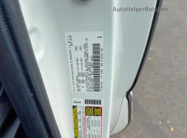 3TYJDAHN1RT013059 2024 TOYOTA TACOMA White Սալոնի հետևի տեսք