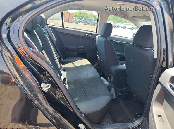 JA32U2FU8GU008027 2016 MITSUBISHI LANCER Black Rear interior view