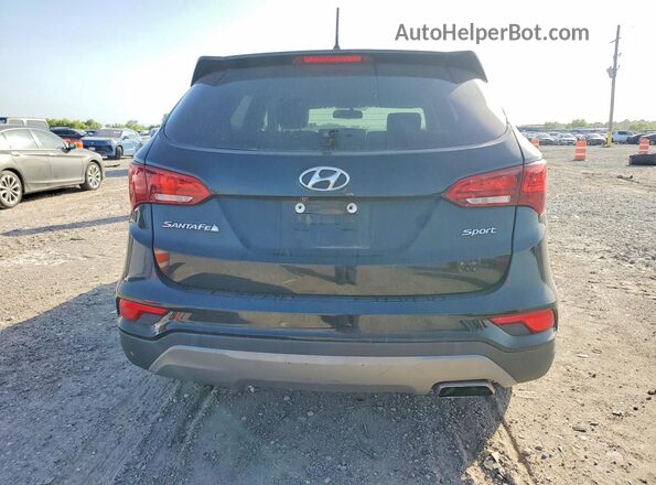 5NMZT3LB3JH076178 2018 HYUNDAI SANTA FE Black Front interior view