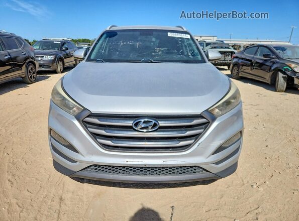 KM8J33A26GU038358 2016 HYUNDAI TUCSON Серебряный Вид сзади