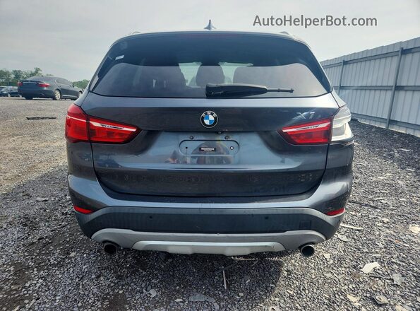 WBXHT3C33H5F72590 2017 BMW X1 Серый Вид салона спереди