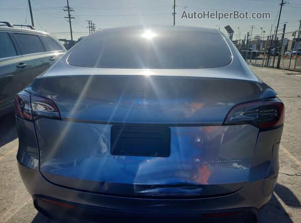 7SAYGDEE7SF240633 2025 TESLA MODEL Серебряный Вид салона спереди