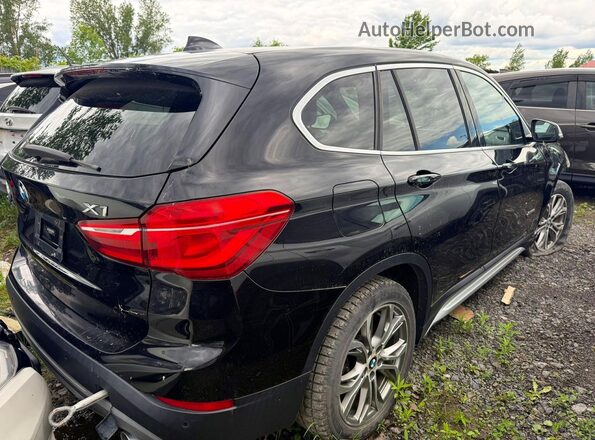 WBXHT3C34J5K22744 2018 BMW X1 Black Front view