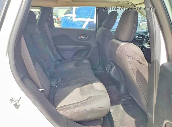 1C4PJLAB6GW234549 2016 JEEP CHEROKEE White Vista interior trasera