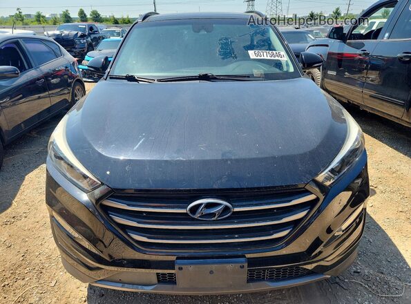 KM8J33A25GU068712 2016 HYUNDAI TUCSON Black Vista trasera