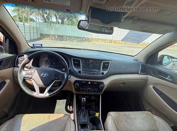 KM8J33A23GU220468 2016 HYUNDAI TUCSON Red Vista de los asientos traseros