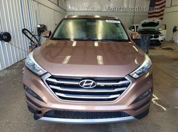 KM8J33A22GU095320 2016 HYUNDAI TUCSON Brown Հետևի տեսք