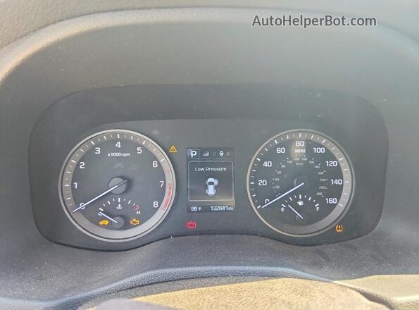 KM8J3CA25HU311078 2017 HYUNDAI TUCSON Silver Rear seats view