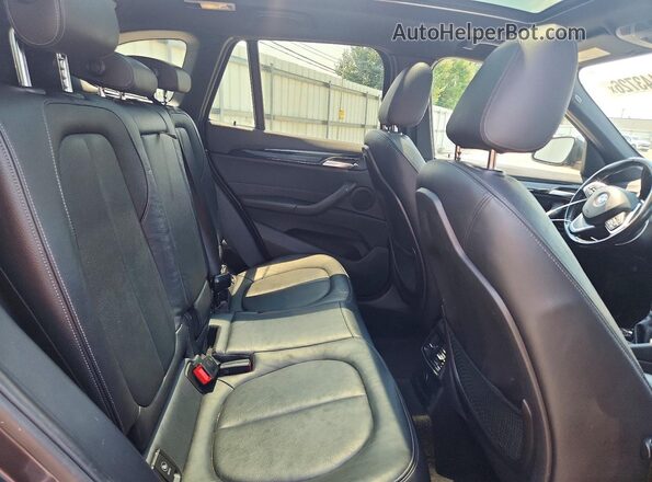 WBXHT3C30J5K25396 2018 BMW X1 Gray Engine compartment view