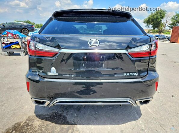 2T2BZMCA2HC056898 2017 LEXUS RX 350 Black Front interior view