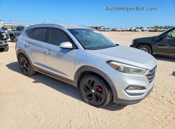 KM8J33A26GU038358 2016 HYUNDAI TUCSON Серебряный Вид спереди