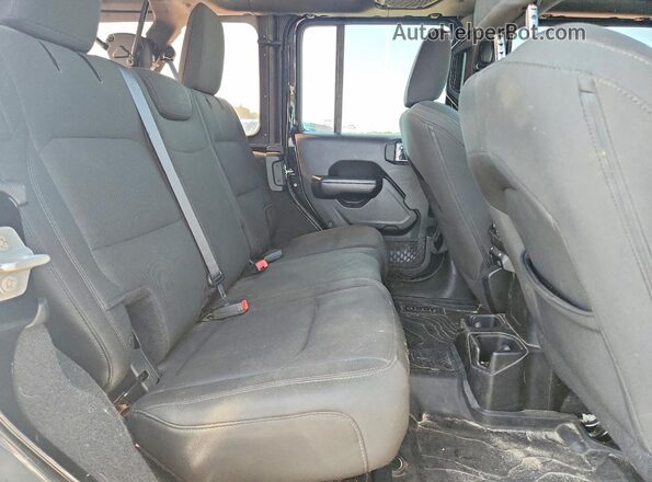 1C4HJXDG4JW147971 2018 JEEP WRANGLER Black Widok wnętrza z tyłu