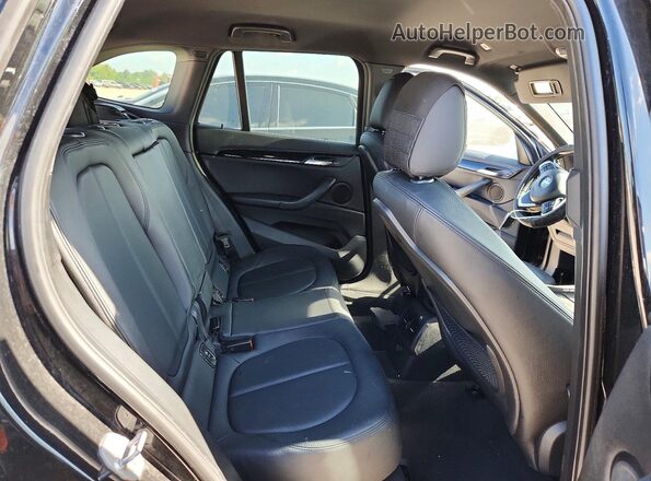 WBXHT3C34G5E55714 2016 BMW X1 Black Widok wnętrza z tyłu