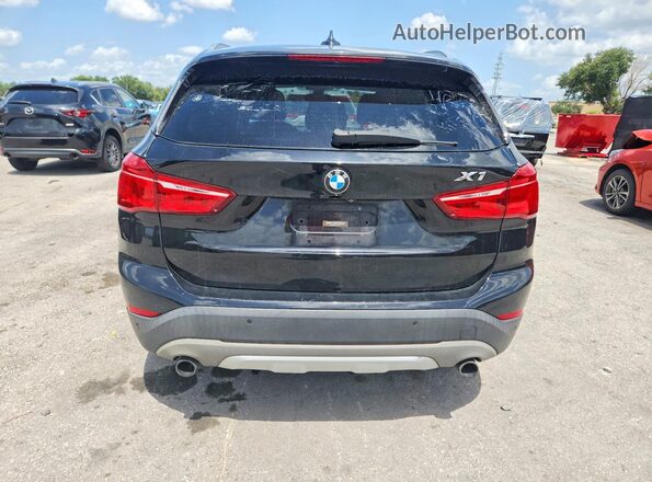 WBXHT3Z37H4A53653 2017 BMW X1 Black Вид салону спереду