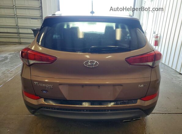 KM8J33A22GU095320 2016 HYUNDAI TUCSON Brown Սալոնի դիմացի տեսք