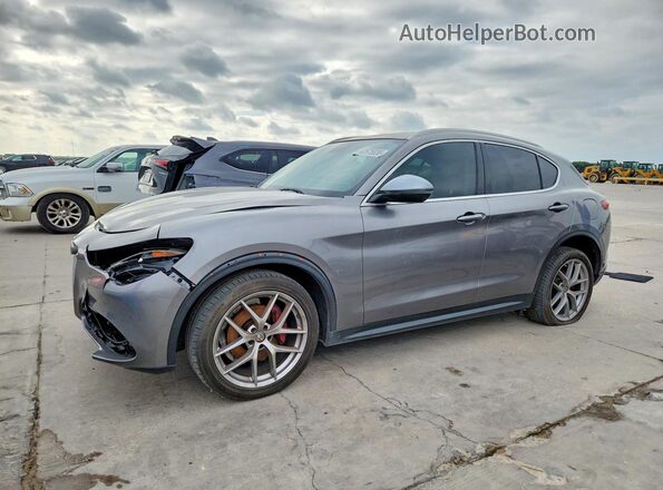 ZASFAKBN0J7B97991 2018 ALFA ROMEO STELVIO Gray Trasero izquierdo