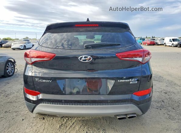 KM8J3CA20HU598586 2017 HYUNDAI TUCSON Black Widok wnętrza z przodu