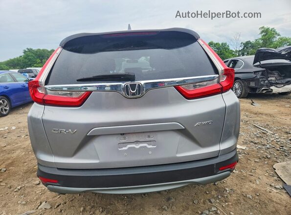 2HKRW2H58JH609133 2018 HONDA CR-V Silver Front interior view