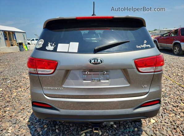 5XYPG4A55HG242073 2017 KIA SORENTO Gray Vista interior delantera