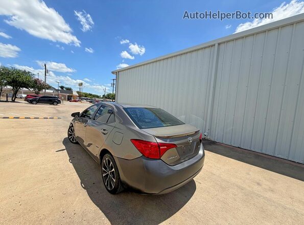 5YFBURHE0HP631432 2017 TOYOTA COROLLA Gray Delantero derecho