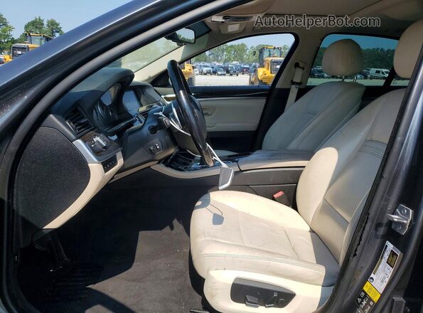 WBA5A7C52GG643628 2016 BMW 5 SERIES Gray Vista del salpicadero