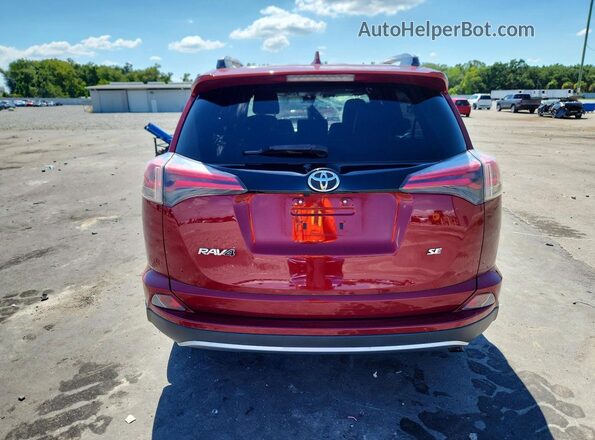 JTMNFREV0JD124681 2018 TOYOTA RAV4 Red Front interior view