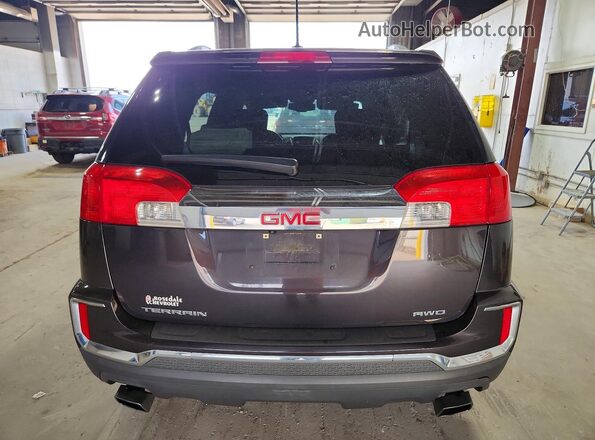 2GKFLTE34G6350288 2016 GMC TERRAIN Черный Вид салона спереди