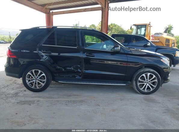4JGDA5GB8KB204549 2019 MERCEDES-BENZ GLE 400 Black Widok wnętrza z tyłu